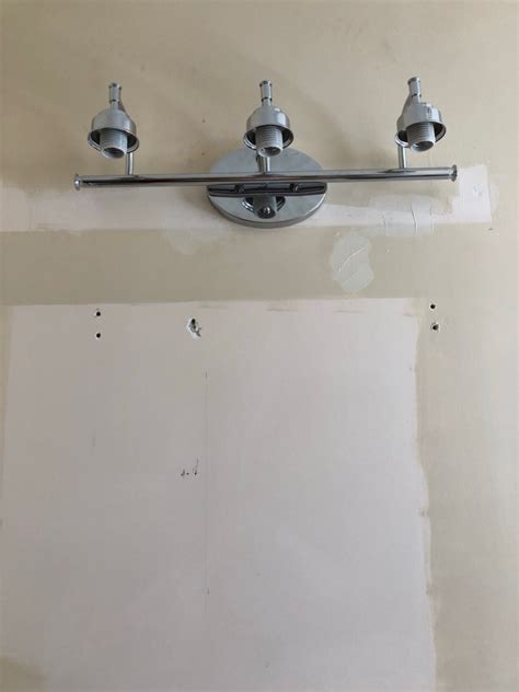 over vanity light fixture without a junction box|off center vanity light replacement.